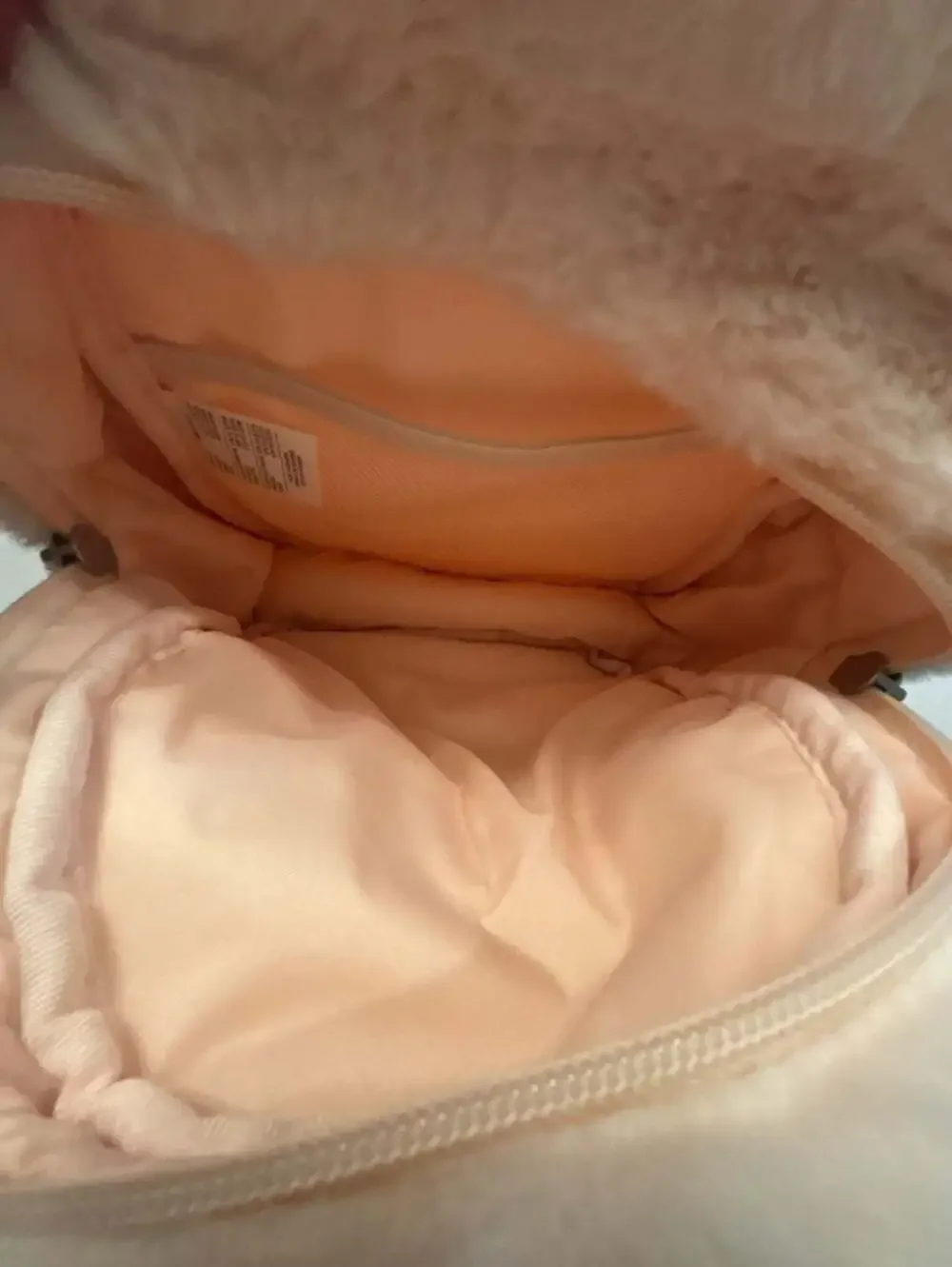 Nike 365 Faux Fur Mini Backpack in Peach/Cream with Black Swoosh